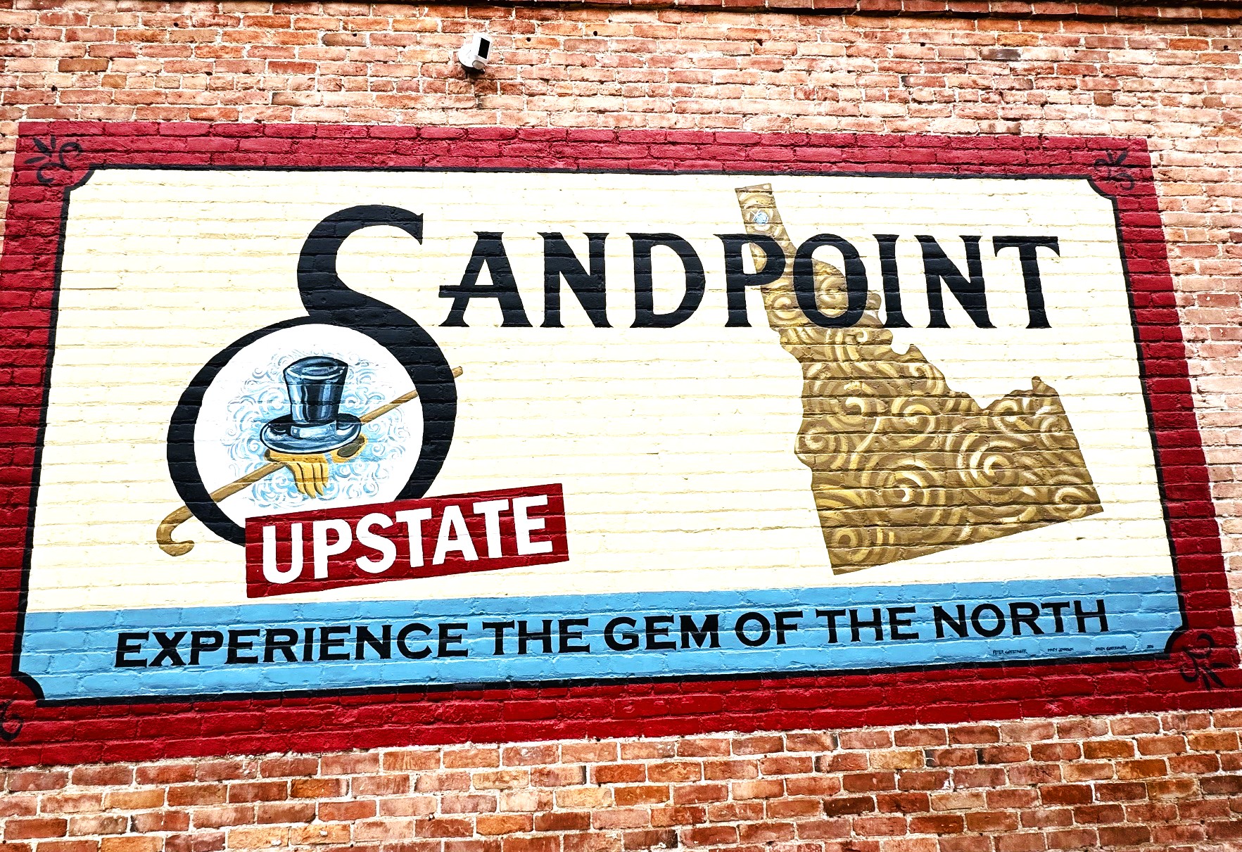 Sandpoint, Idaho mural reading Experience the Gem of the North